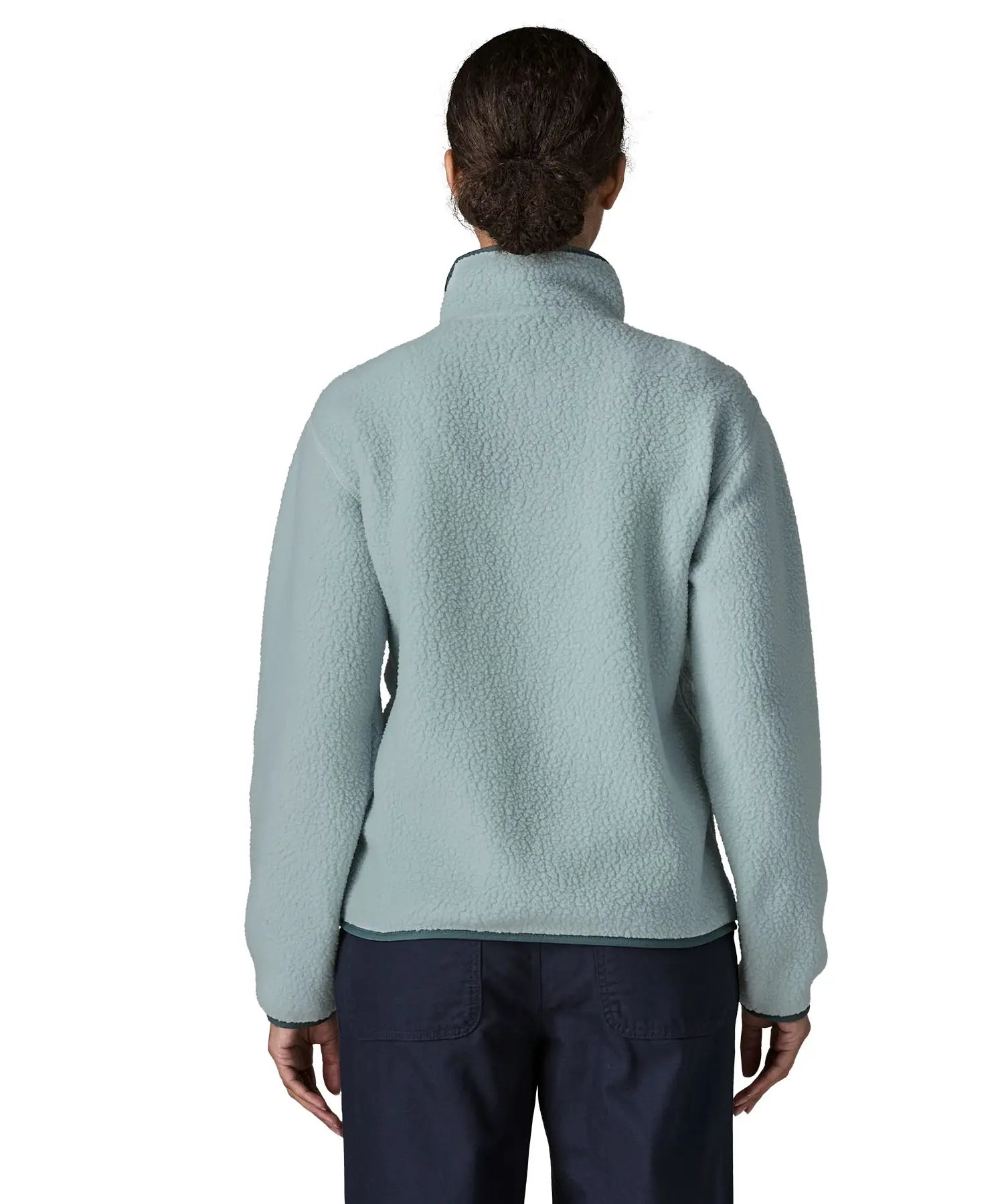 Back of woman wearing the Patagonia women's retro pile fleece jacket in virtually blue. Full zip fleece jacket with zippererd chest and hand warmer pockets.