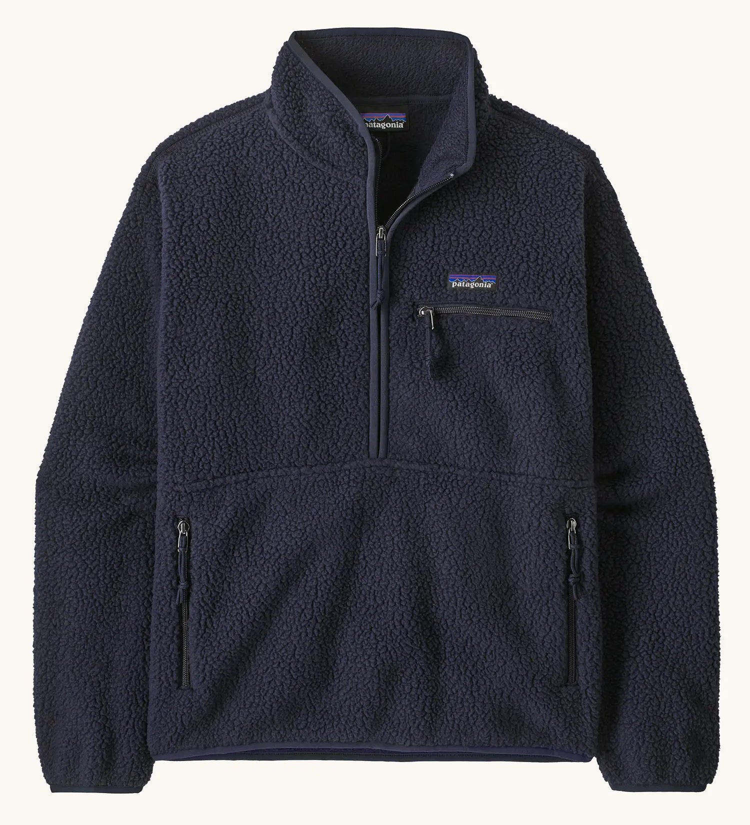 Patagonia women's retro pile fleece marsupial top in dark sunken blue. Half zip closure, zippererd chest pocket and marsupial handpocket. 