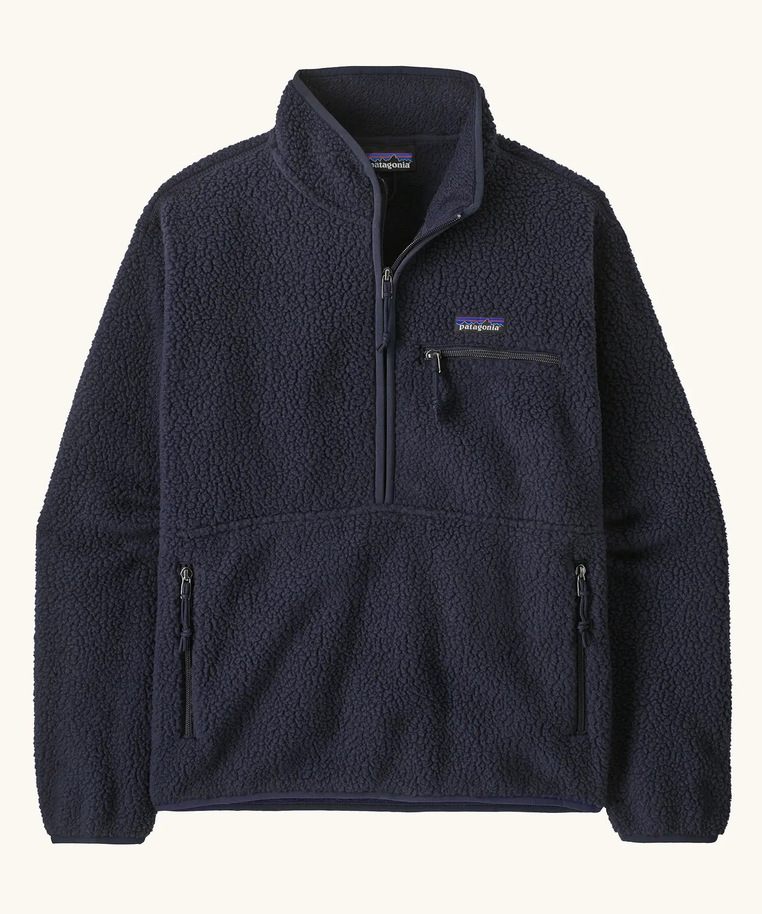 Patagonia women's retro pile fleece marsupial top in dark sunken blue. Half zip closure, zippererd chest pocket and marsupial handpocket. 