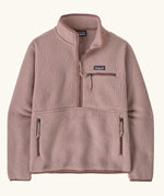 Patagonia women's retro pile fleece marsupial top in stingray mauve. Half zip closure, zippered chest pocket and zippered marsupial hand warmer pocket. 