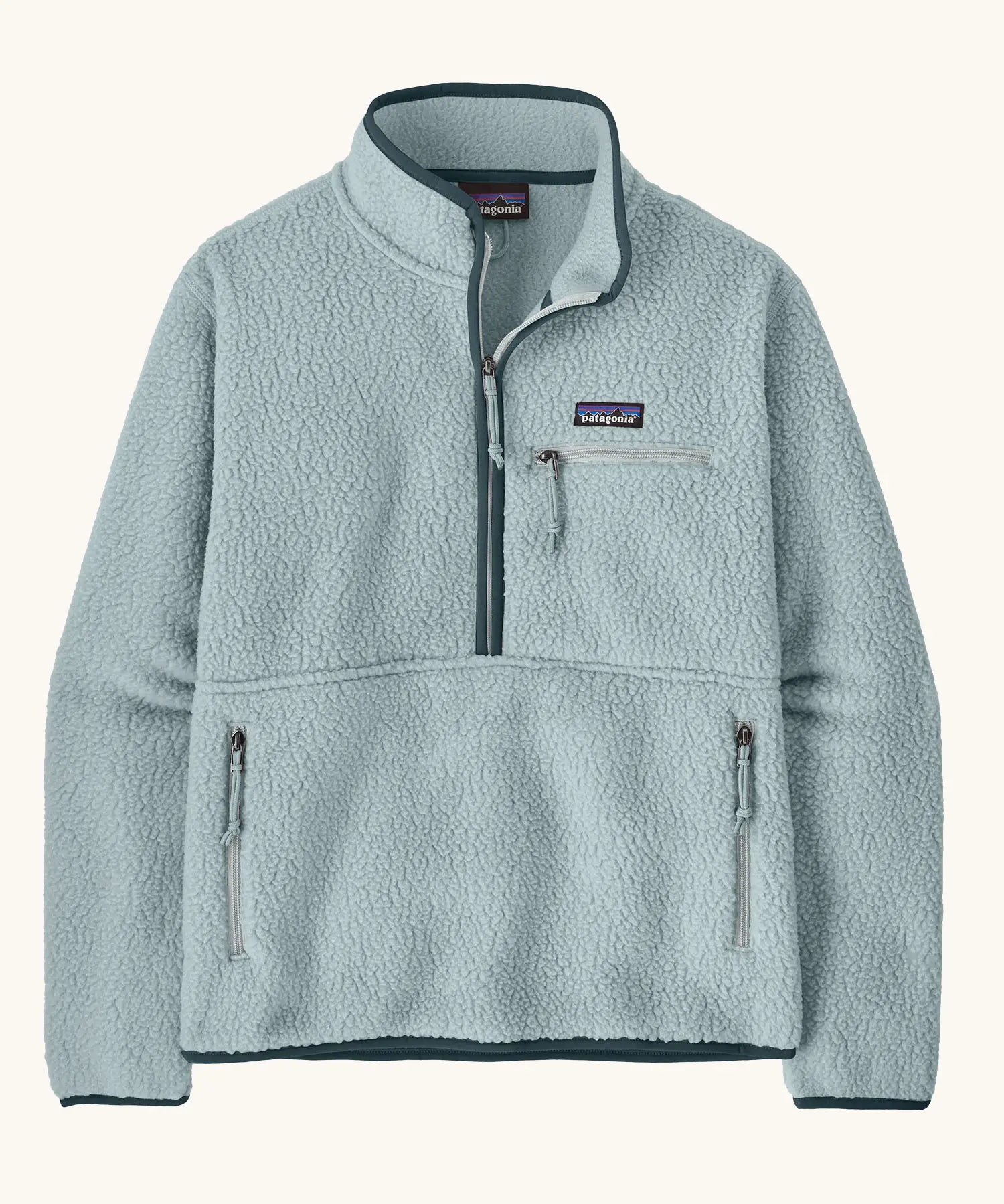 Patagonia women's retro pile fleece marsupial top in light virtually blue. Half zip closure, zippered chest pocket and zippered marsupial hand warmer pocket. 