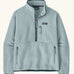 Patagonia women's retro pile fleece marsupial top in light virtually blue. Half zip closure, zippered chest pocket and zippered marsupial hand warmer pocket. 