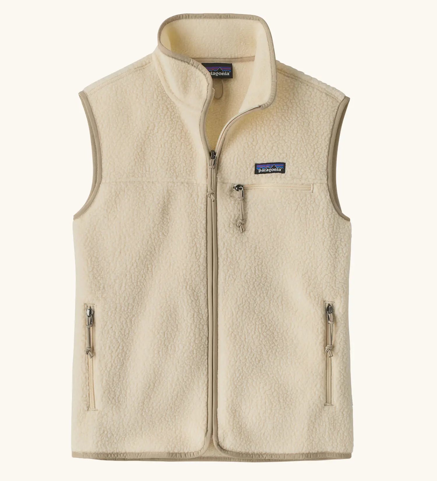 Patagonia women's retro pile fleece vest gilet in natural. Full length zip gilet with zippered chest and hand warmer pockets.