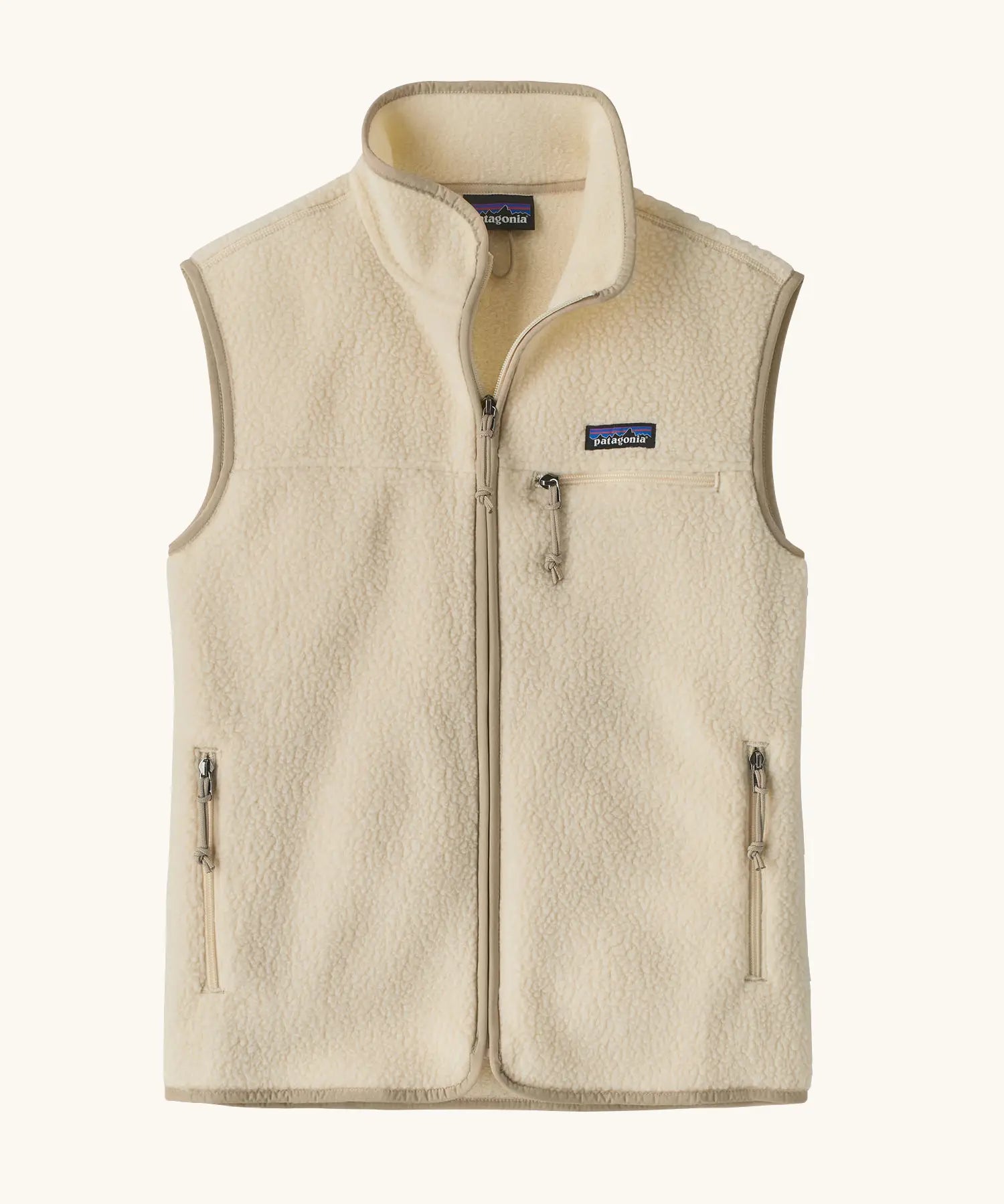 Patagonia women's retro pile fleece vest gilet in natural. Full length zip gilet with zippered chest and hand warmer pockets.