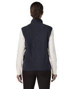 Back of woman wearing the Patagonia women's retro pile fleece vest gilet in sunken blue.