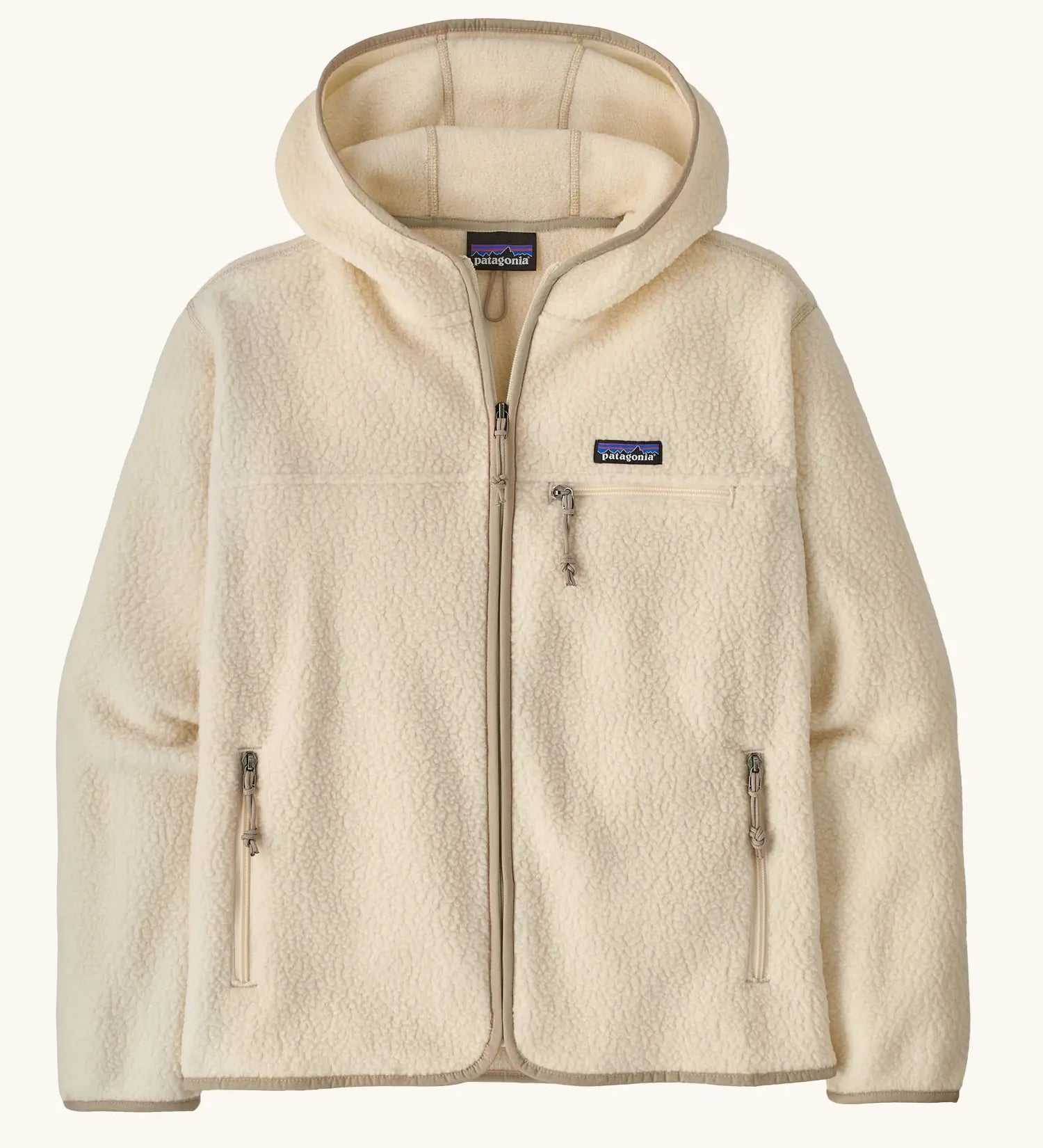 Patagonia women's retro pile hoody in natural. Full zip fleece jacket with zipped chest pocket and hand warmer pockets.