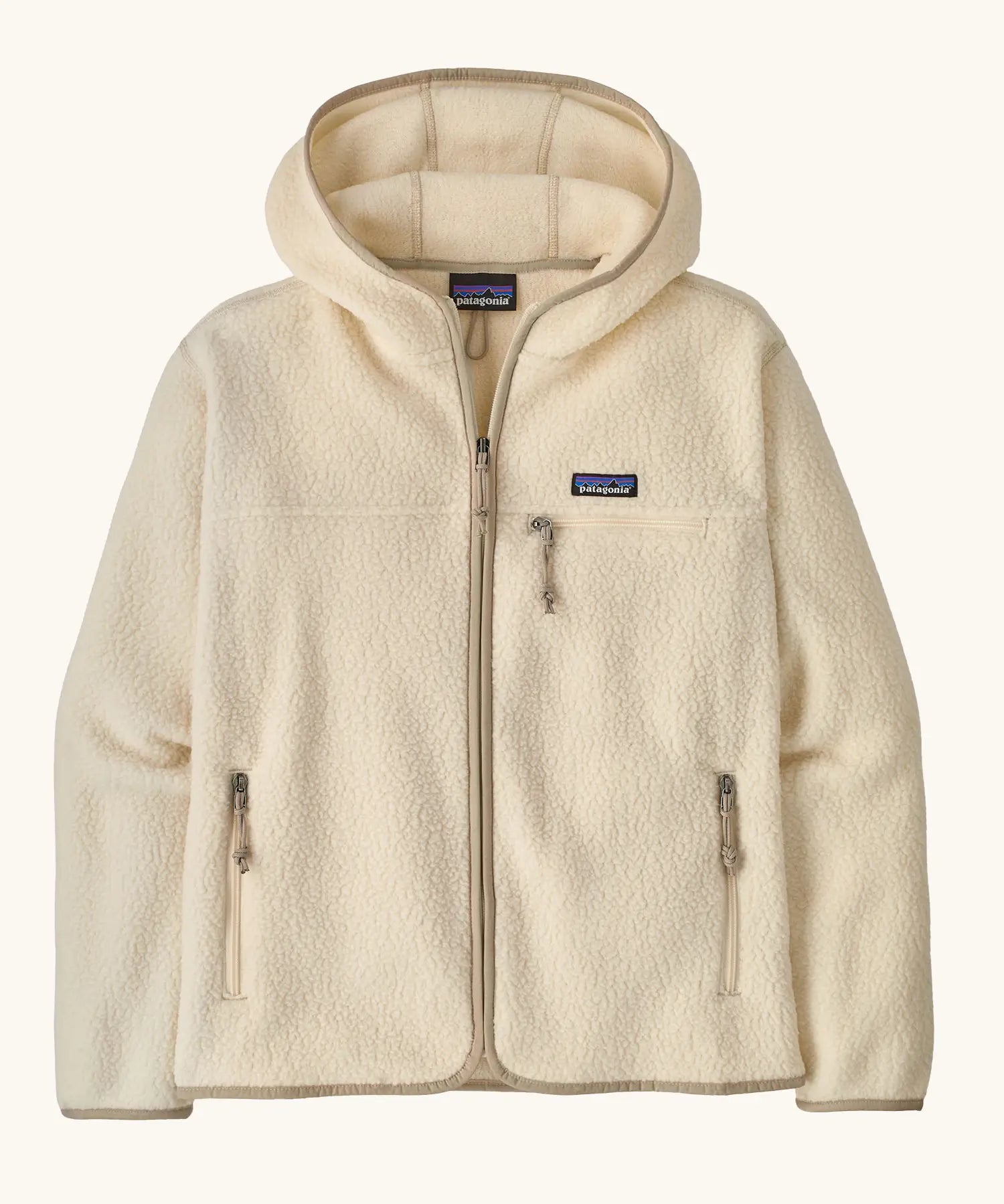 Patagonia women's retro pile hoody in natural. Full zip fleece jacket with zipped chest pocket and hand warmer pockets.