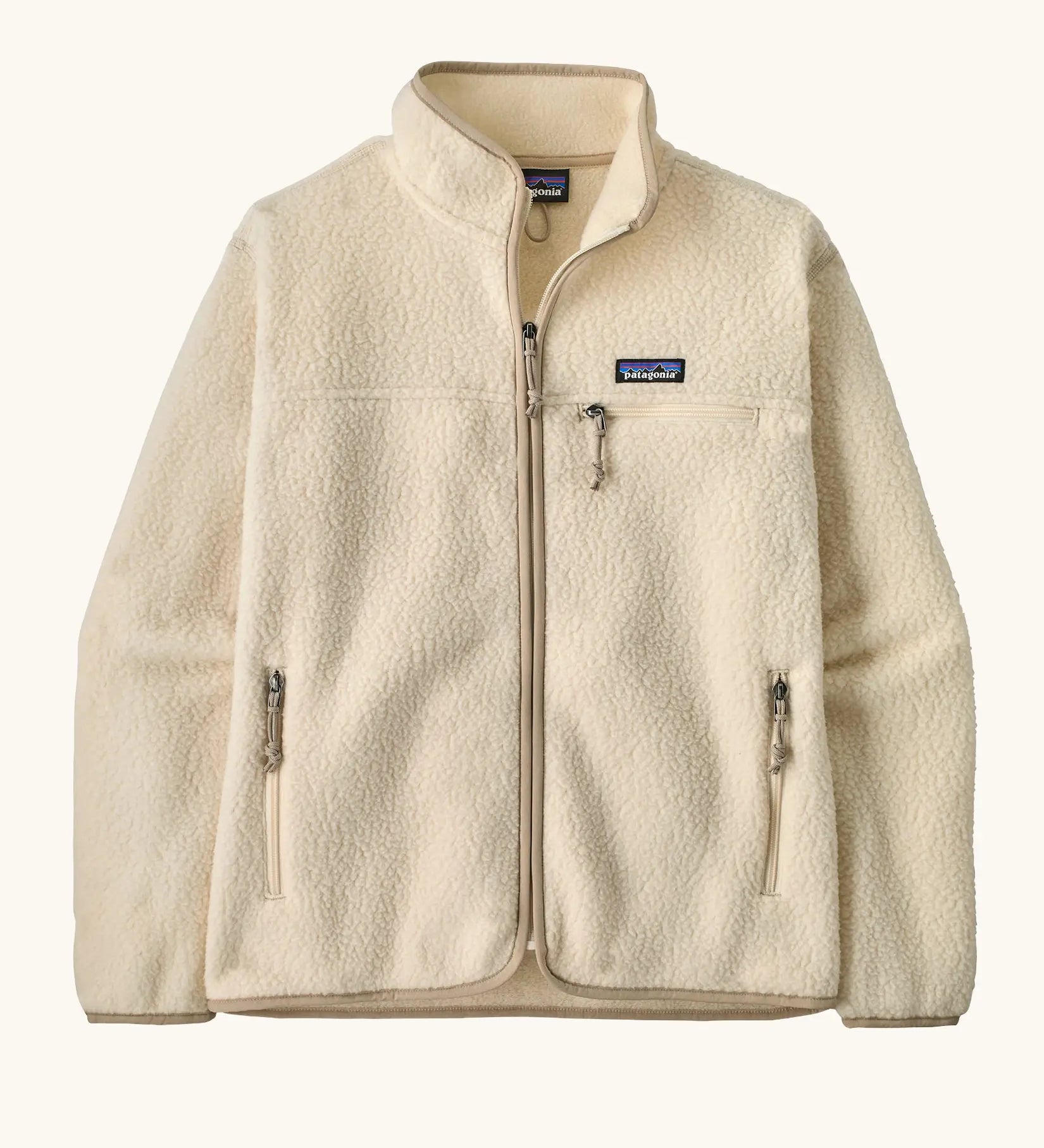 Patagonia women's retro pile fleece jacket in natural cream. Zipped front with two zipped hand pockets and a zipped chest pocket.