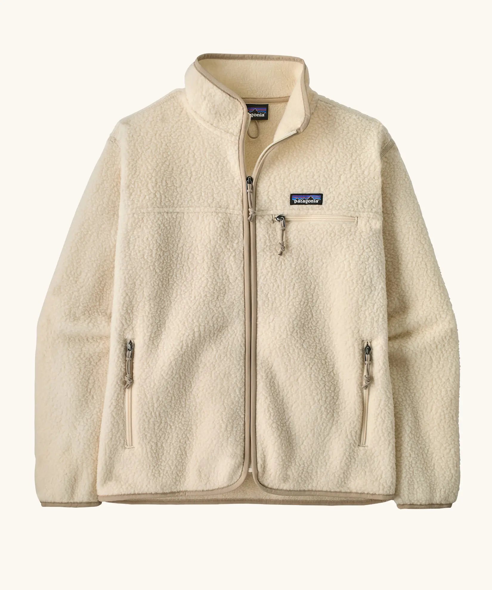 Patagonia women's retro pile fleece jacket in natural cream. Zipped front with two zipped hand pockets and a zipped chest pocket.