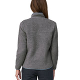 The back of a woman wearing a grey coloured Patagonia Women's Retro Pile Jkt