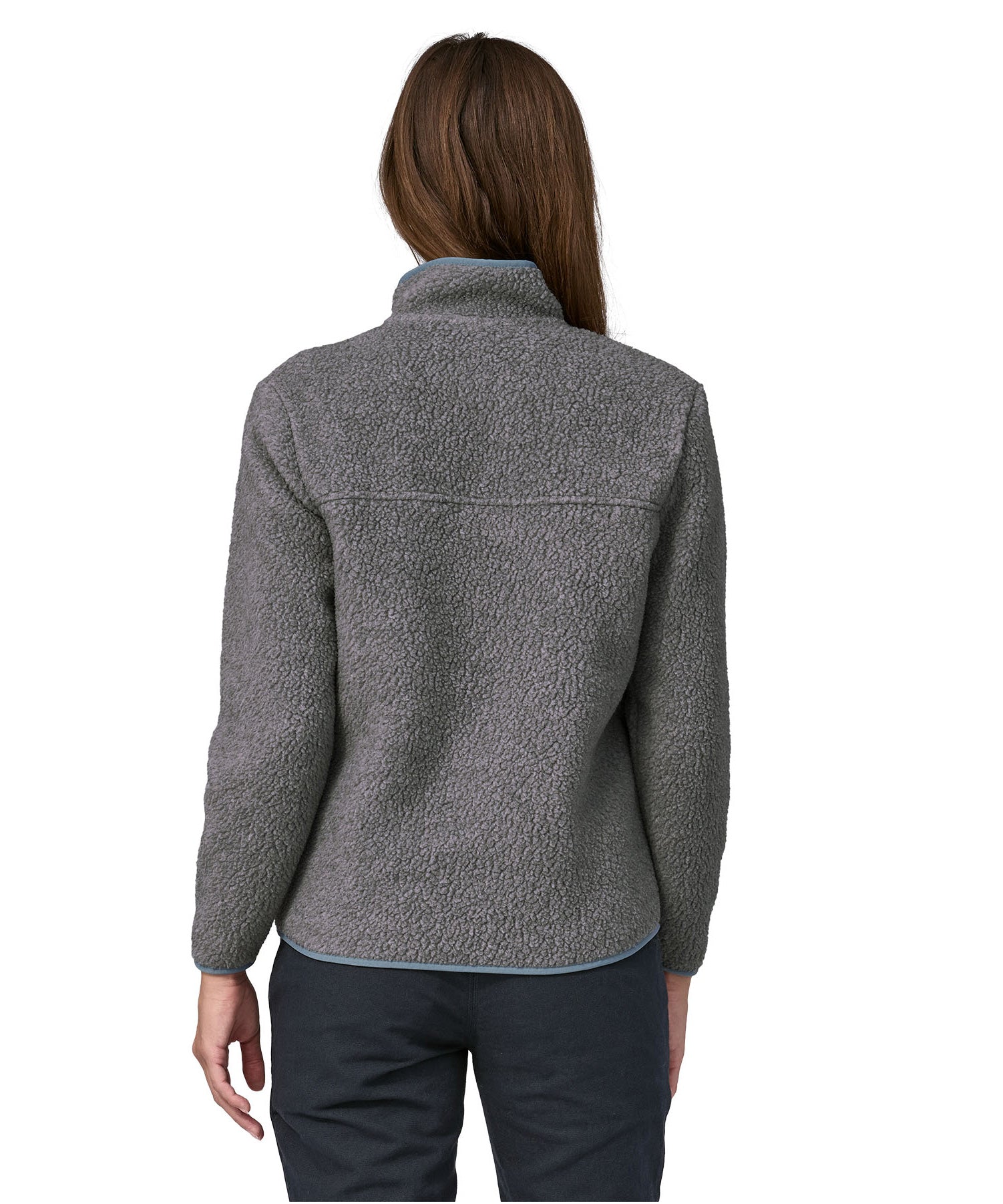 The back of a woman wearing a grey coloured Patagonia Women's Retro Pile Jkt