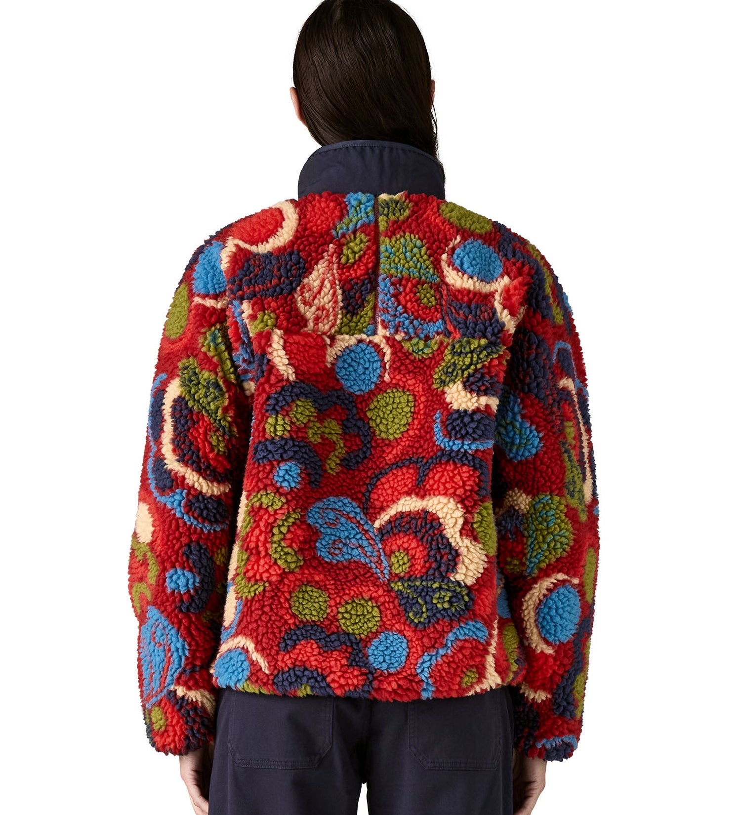 Rear view of the Patagonia river river amanita red retro fleece jacket worn by an adult. 