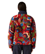 Rear view of the Patagonia river river amanita red retro fleece jacket worn by an adult. 