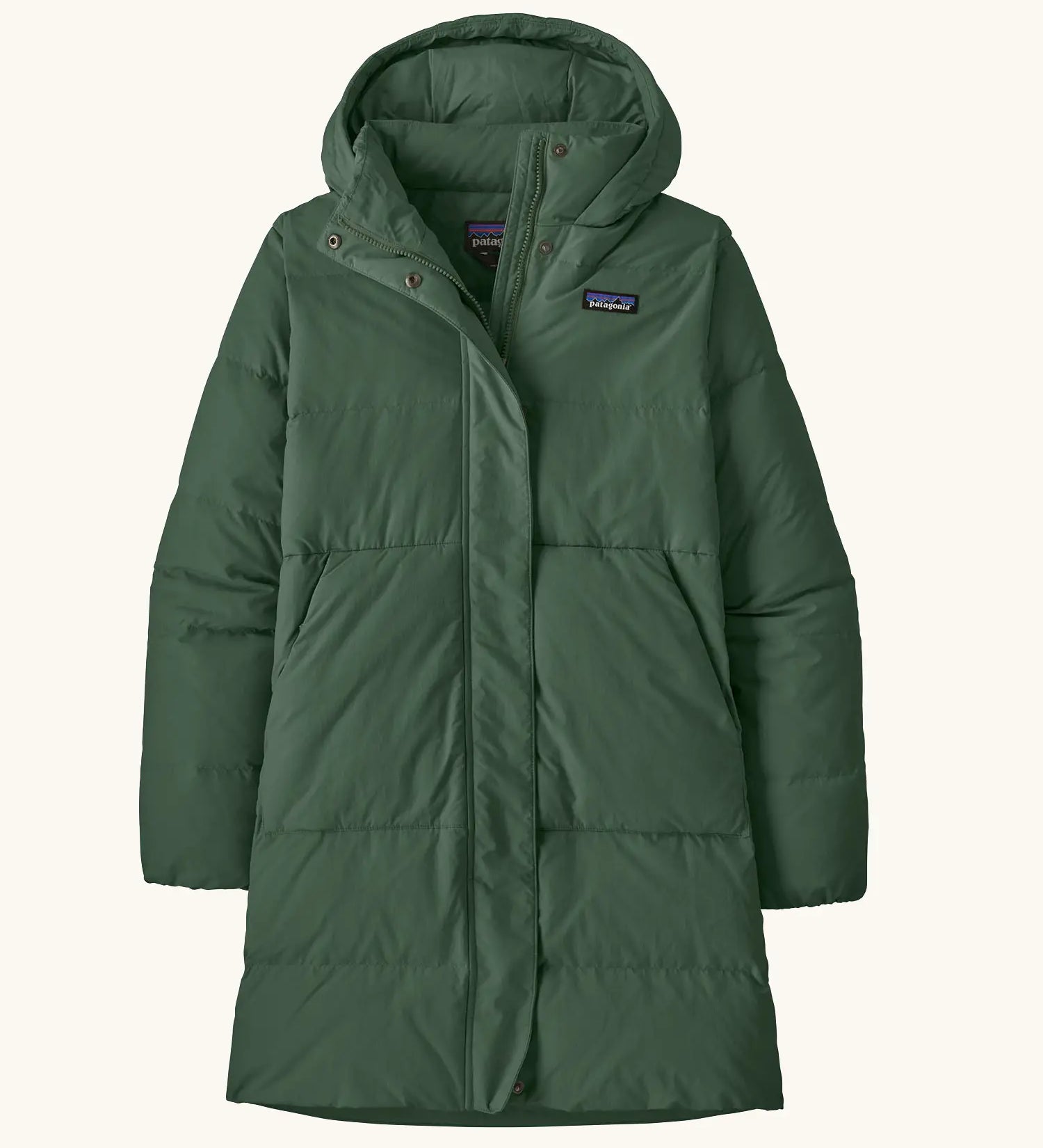 Patagonia women's sisar down insulated parka in canopy green with two large front pockets.