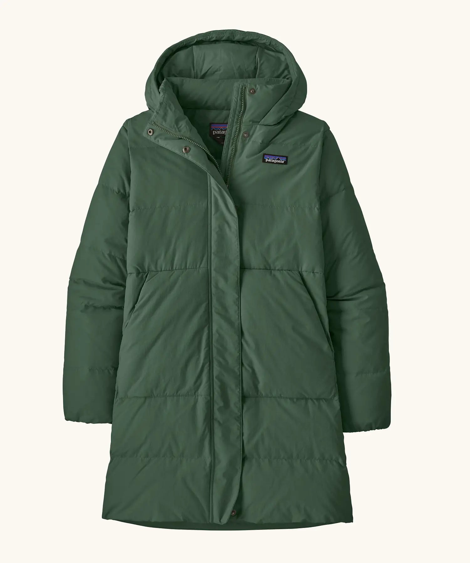 Patagonia women's sisar down insulated parka in canopy green with two large front pockets.