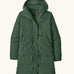 Patagonia women's sisar down insulated parka in canopy green with two large front pockets.