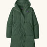 Patagonia women's sisar down insulated parka in canopy green with two large front pockets.
