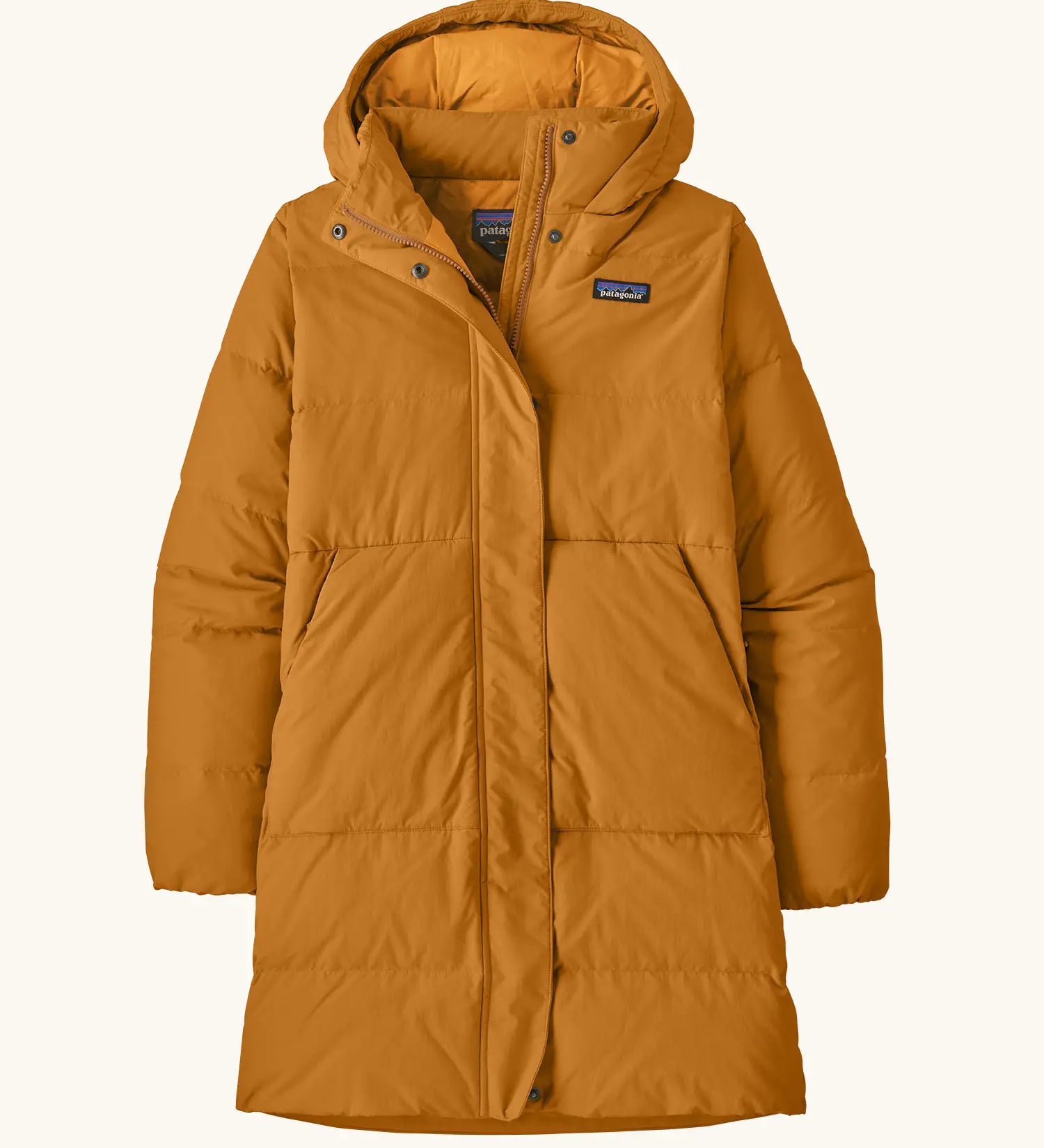 Patagonia women's sisar down insulated parka in cinnamon brown with two large front pockets.