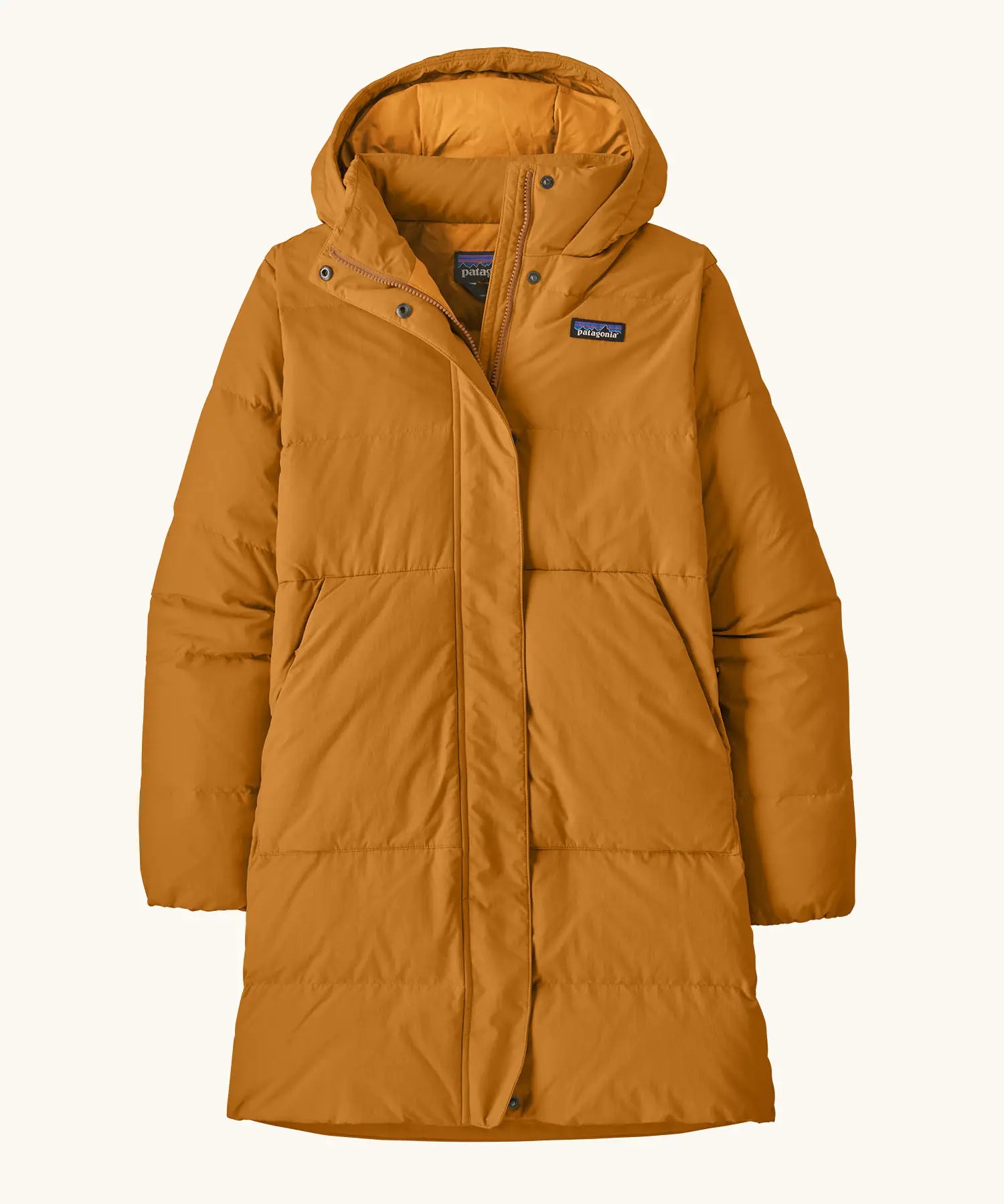 Patagonia women's sisar down insulated parka in cinnamon brown with two large front pockets.