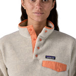 Patagonia women's synchilla fleece front snaps and pocket detail