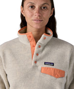 Patagonia women's synchilla fleece front snaps and pocket detail