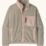 Patagonia women's synchilla fleece jacket in oatmeal heather and pink frost. Full zip jacket with zippered chest pocket and handwarmer pockets.