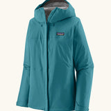 Patagonia women's waterproof torrentshell 3L rain jacket in glacial blue with adjustable hood, zippered handwarmer pockets.