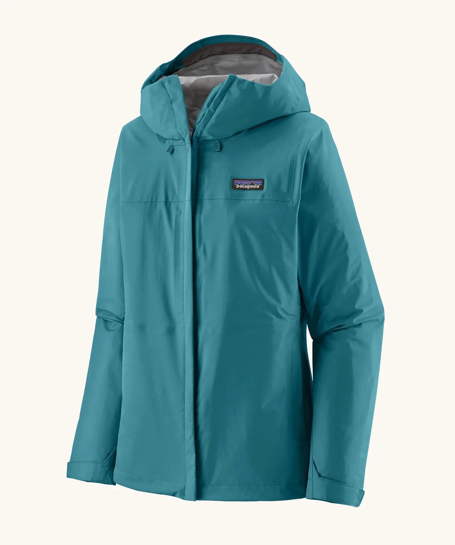 Patagonia women's waterproof torrentshell 3L rain jacket in glacial blue with adjustable hood, zippered handwarmer pockets.