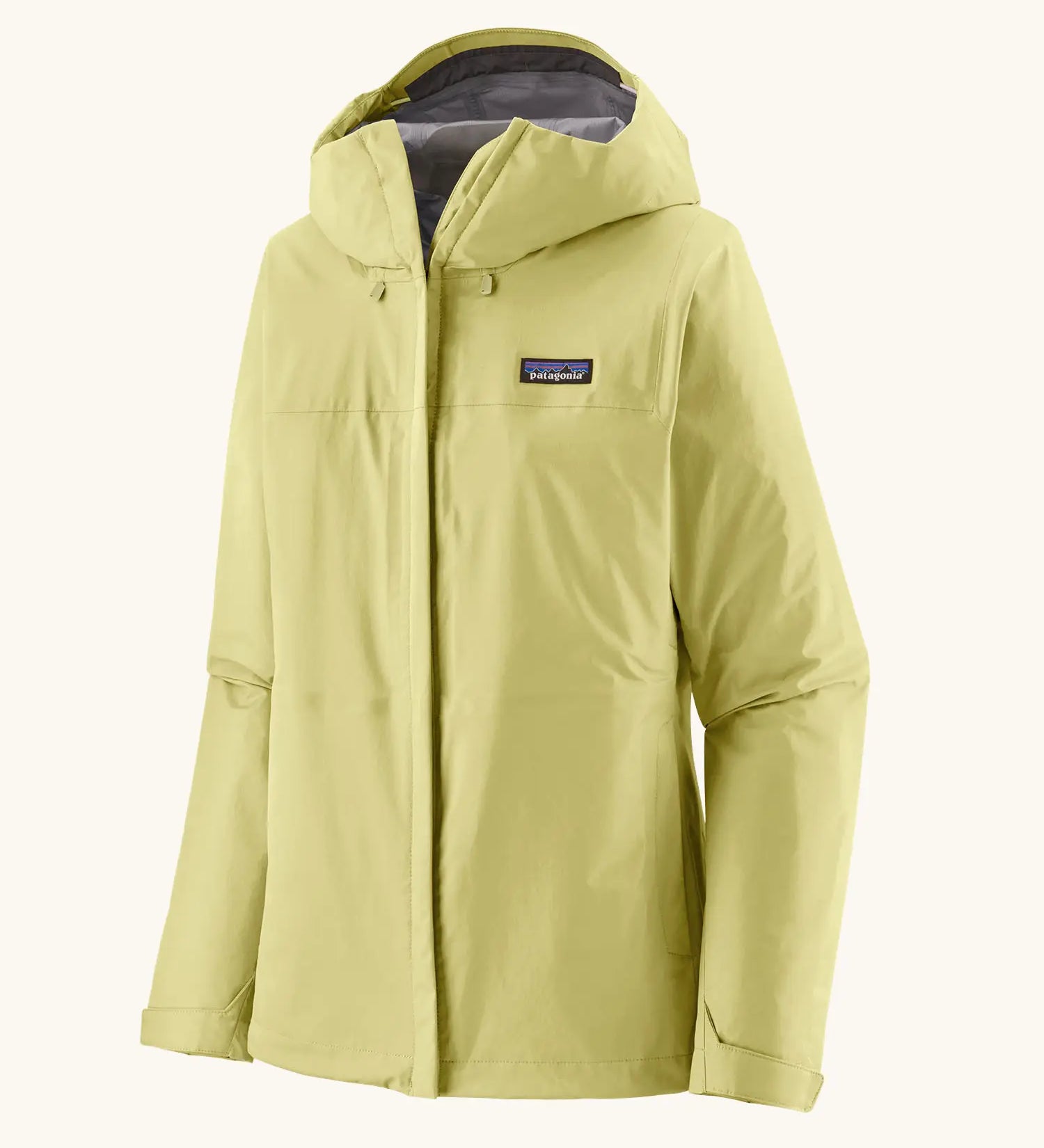 Patagonia women's waterproof torrentshell 3L rain jacket in light vellum green with adjustable hood, zippered handwarmer pockets.