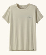 Patagonia women's white quick drying capilene short sleeve t-shirt with small brand text logo on the chest. 