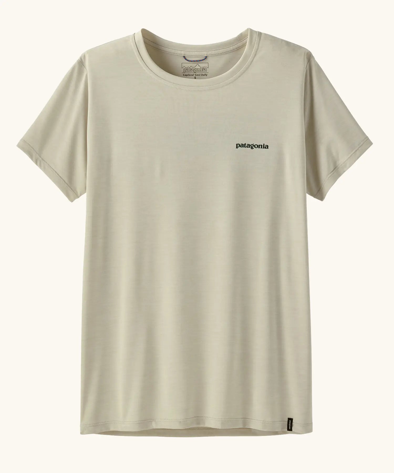 Patagonia women's white quick drying capilene short sleeve t-shirt with small brand text logo on the chest. 
