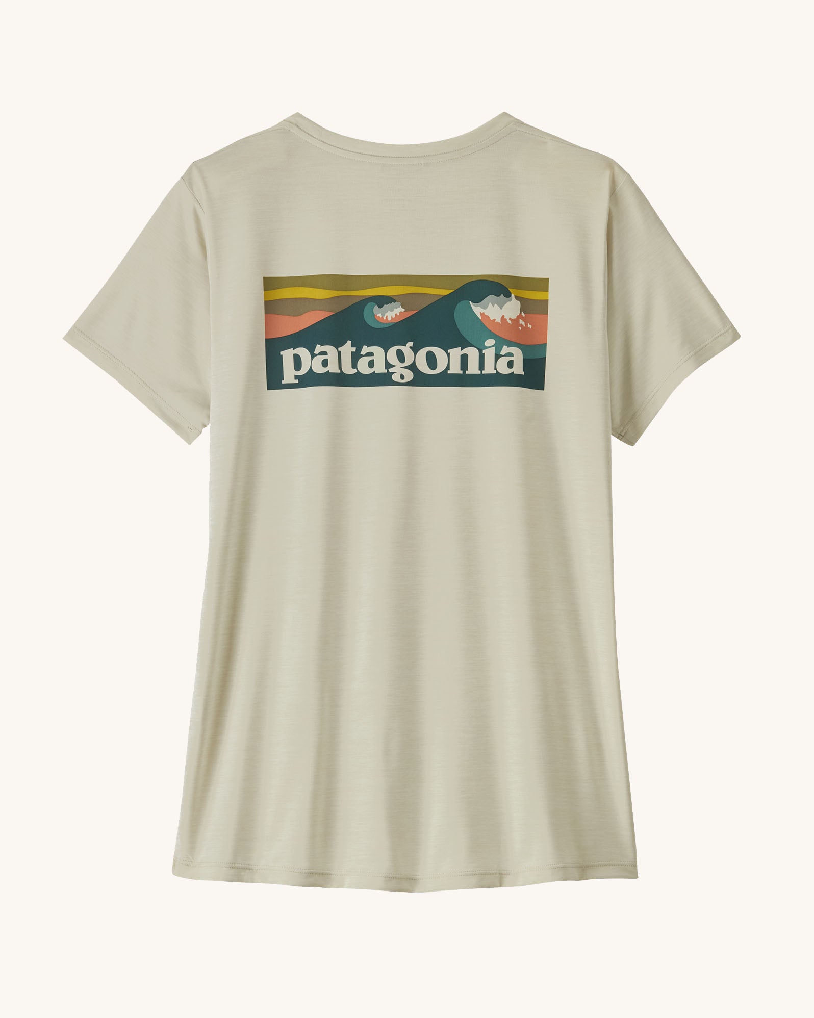 Patagonia women's warm off white capilene short sleeved t-shirt with boardshort logo across the back. 