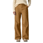 An adult wearing the Patagonia women's trousers in nest brown showing the wide leg fit 
