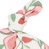 A close up of the Pigeon Organics floral knotted baby hat available at Babipur showing the knot detail