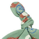 A close up of the Pigeon Organics green cycling fox knotted baby hat available at Babipur showing the knot detail