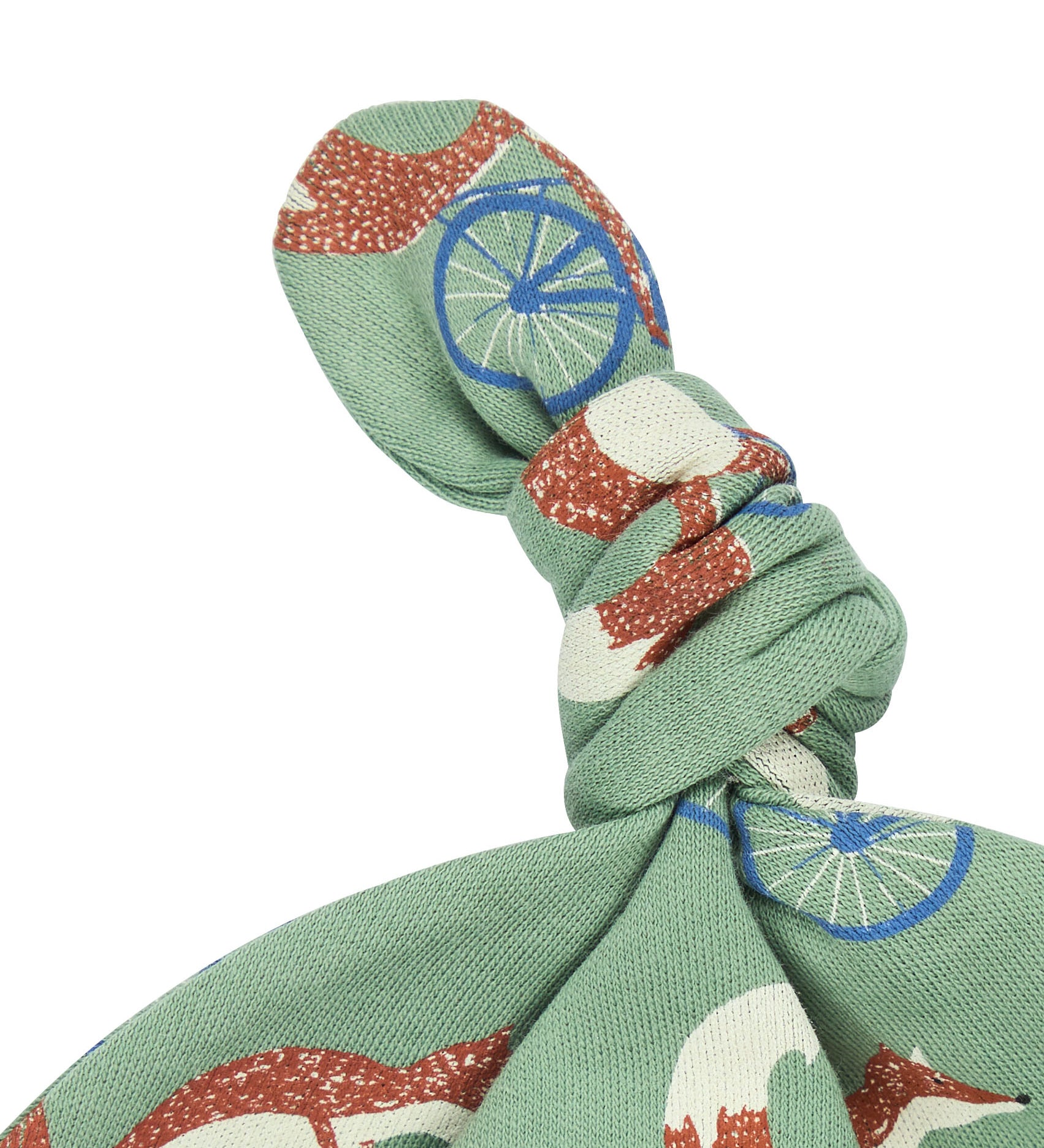 A close up of the Pigeon Organics green cycling fox knotted baby hat available at Babipur showing the knot detail