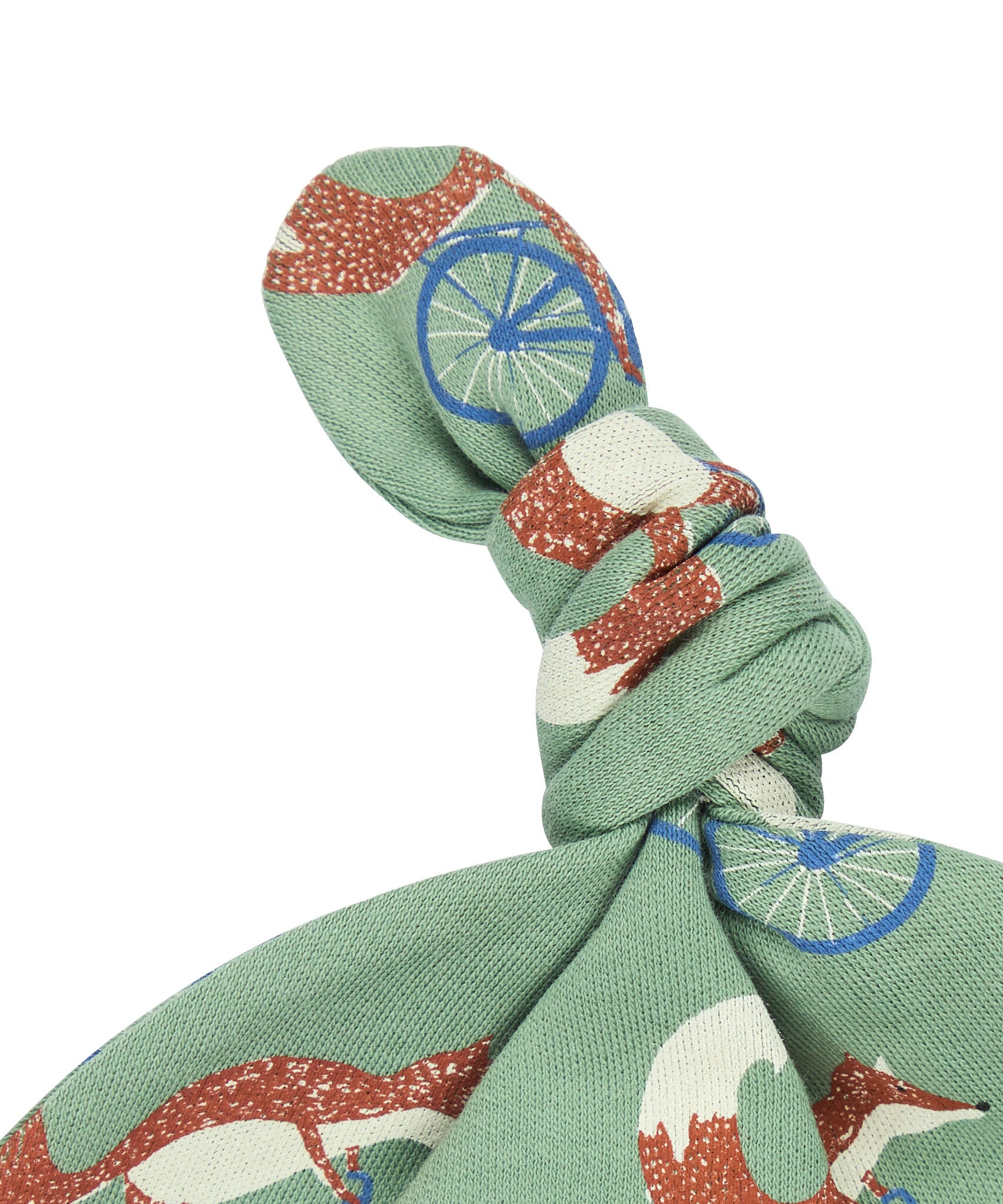 A close up of the Pigeon Organics green cycling fox knotted baby hat available at Babipur showing the knot detail