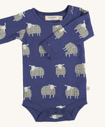 Pigeon Organics sheep body - GOTS organic cotton baby body in a navy blue colour, long sleeves and popper fasteners at the crotch for easy fitting. Features multiple prints of a playful standing white sheep 