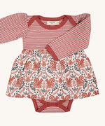 Pigeon Organics squirrel baby dress. A pale rust striped top and printed woven skirt on 100% GOTS organic cotton fabric. Features poppers at the crotch for easy changing.