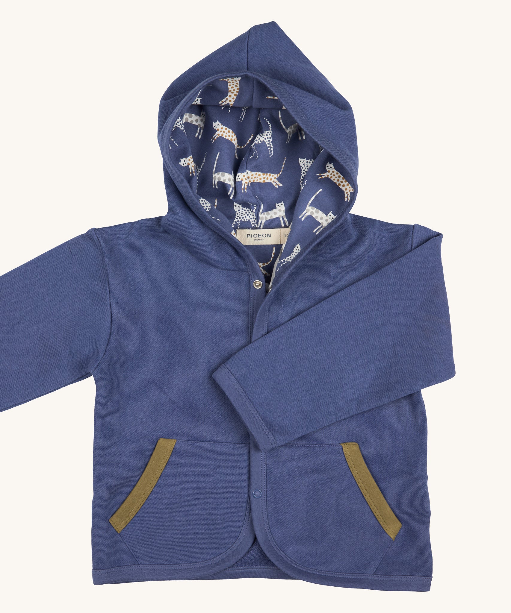 Pigeon Organics baby jacket in velvet blue. 100% GOTS organic cotton hooded jacket with popper fasteners, side pockets and a printed inner hood lining