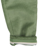 A close up of the Pigeon Organics lined cord trousers available at Babipur showing the green and white striped design on the inner liner 