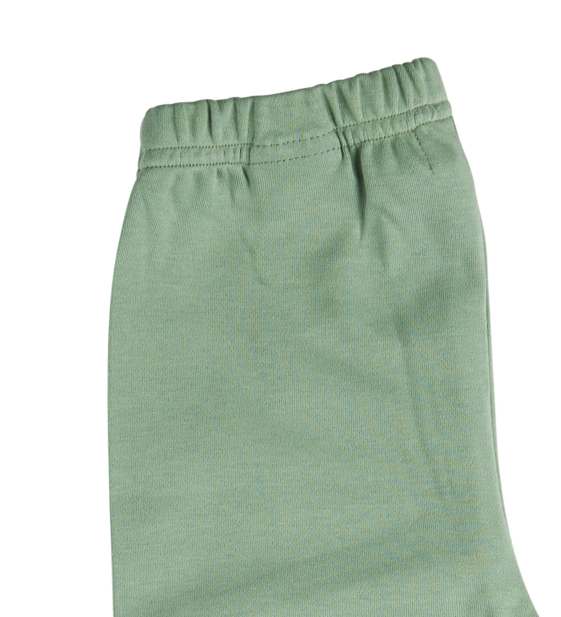 A close up of the Pigeon Organics green leggings available at Babipur showing the elasticated waistband detail