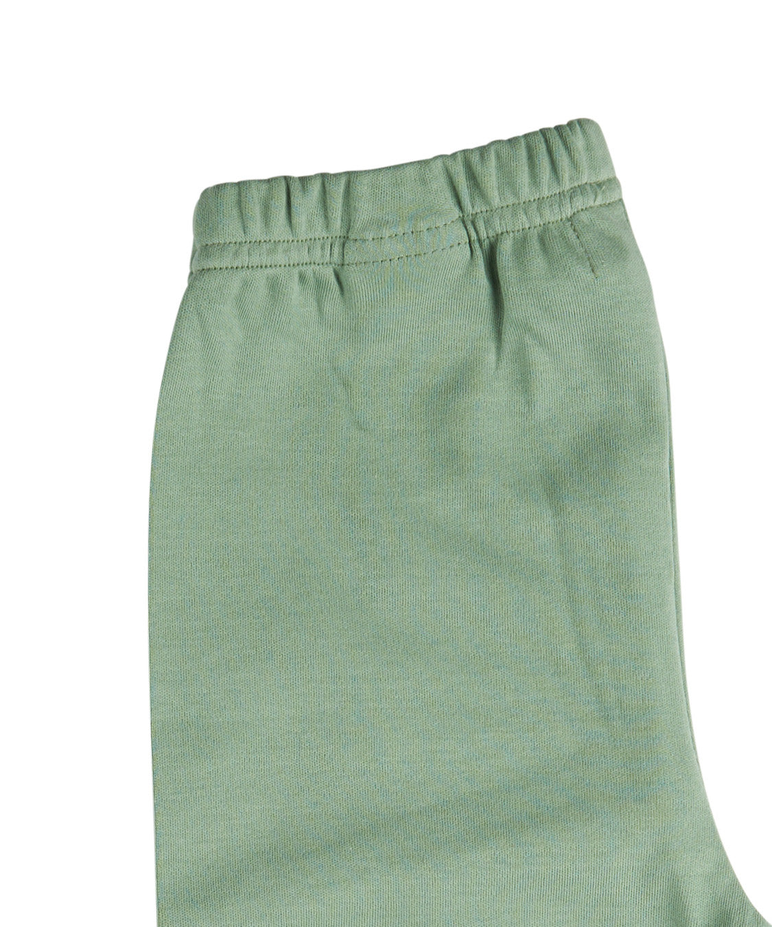 A close up of the Pigeon Organics green leggings available at Babipur showing the elasticated waistband detail