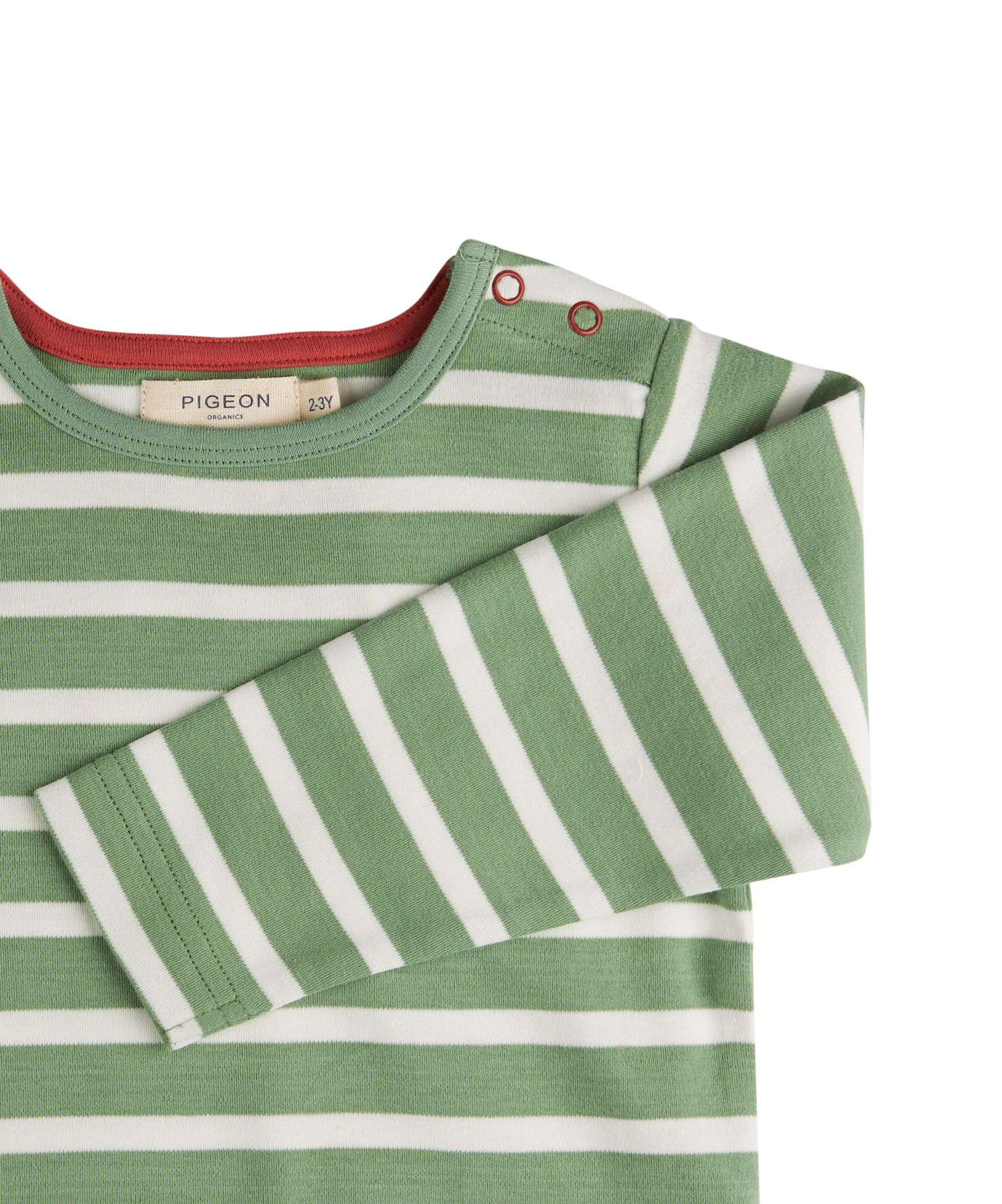 A close up of the green breton striped Pigeon organics long sleeve top available at Babipur showing the popper fastener detail on the shoulder