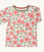 Pigeon Organics large floral t-shirt - GOTS organic cotton t-shirt with long sleeves, shoulder poppers and green neck trim. Features multiple prints of artistic pink flowers and leaves.