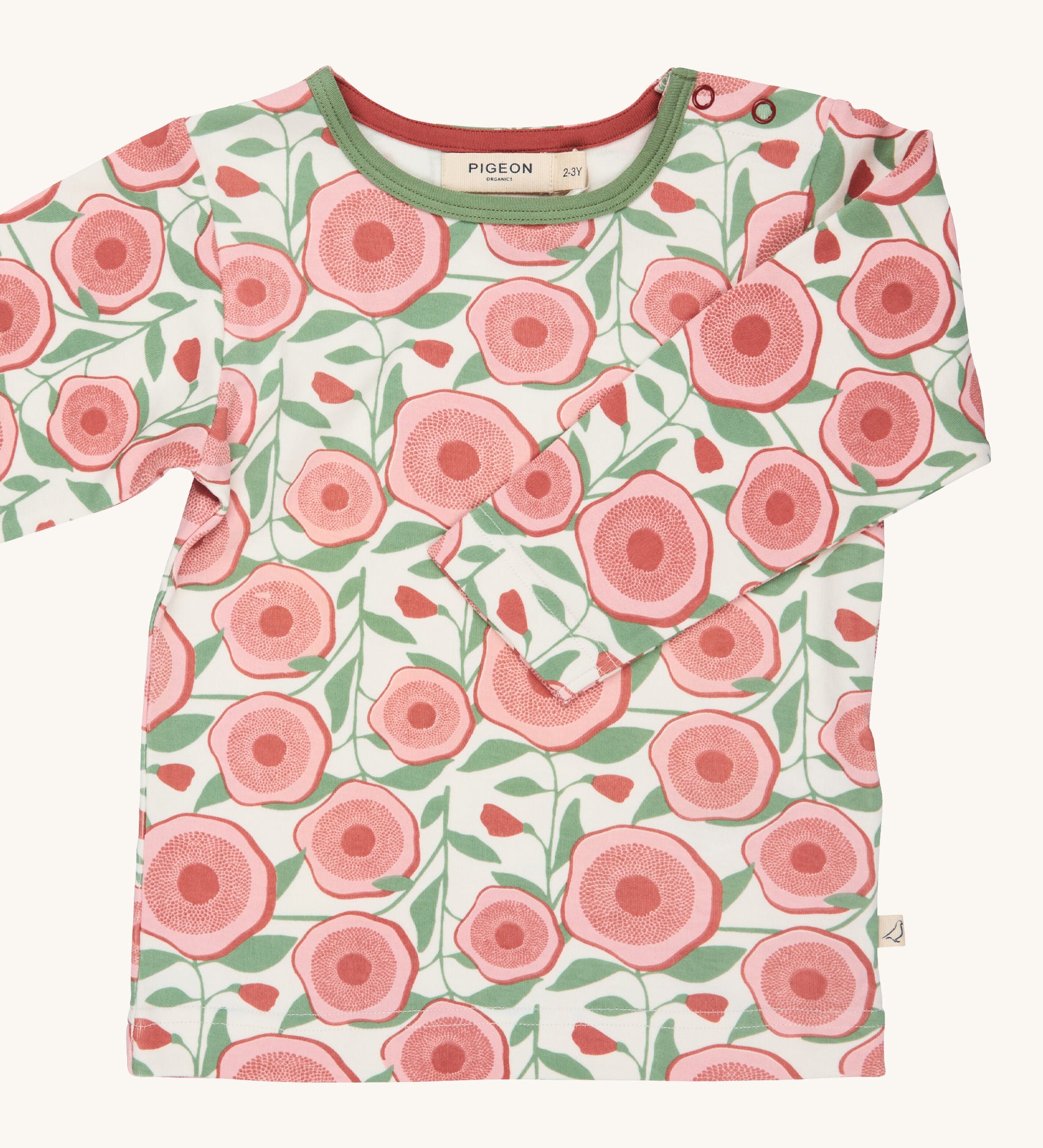 Pigeon Organics large floral t-shirt - GOTS organic cotton t-shirt with long sleeves, shoulder poppers and green neck trim. Features multiple prints of artistic pink flowers and leaves.