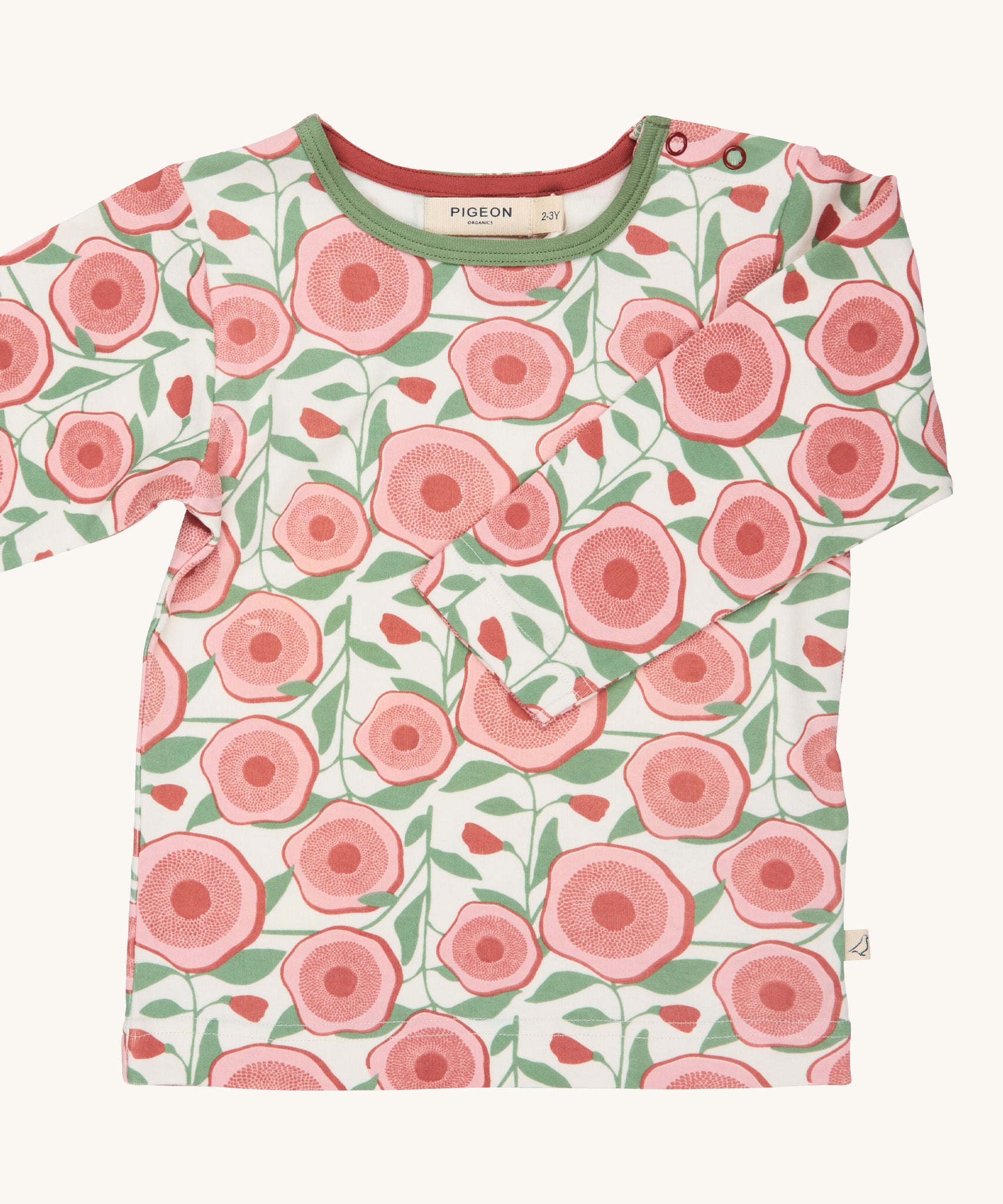 Pigeon Organics large floral t-shirt - GOTS organic cotton t-shirt with long sleeves, shoulder poppers and green neck trim. Features multiple prints of artistic pink flowers and leaves.