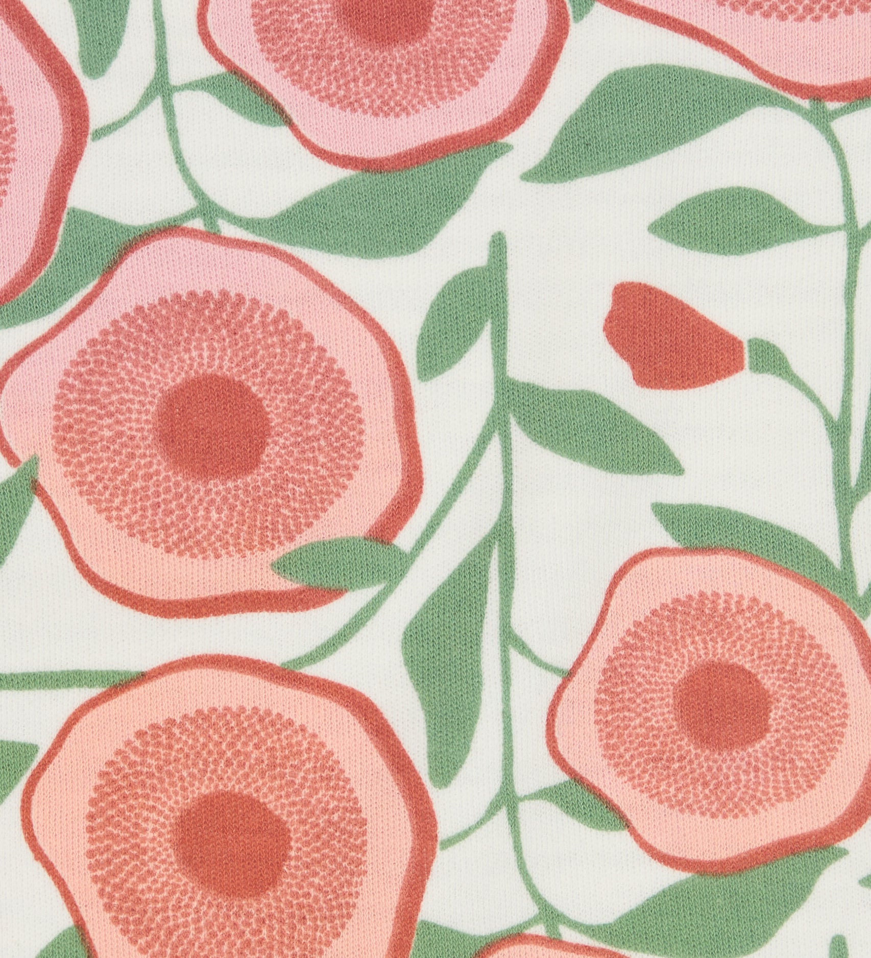 Close up of the Pigeon Organics large floral design printed on neutral coloured organic cotton fabric