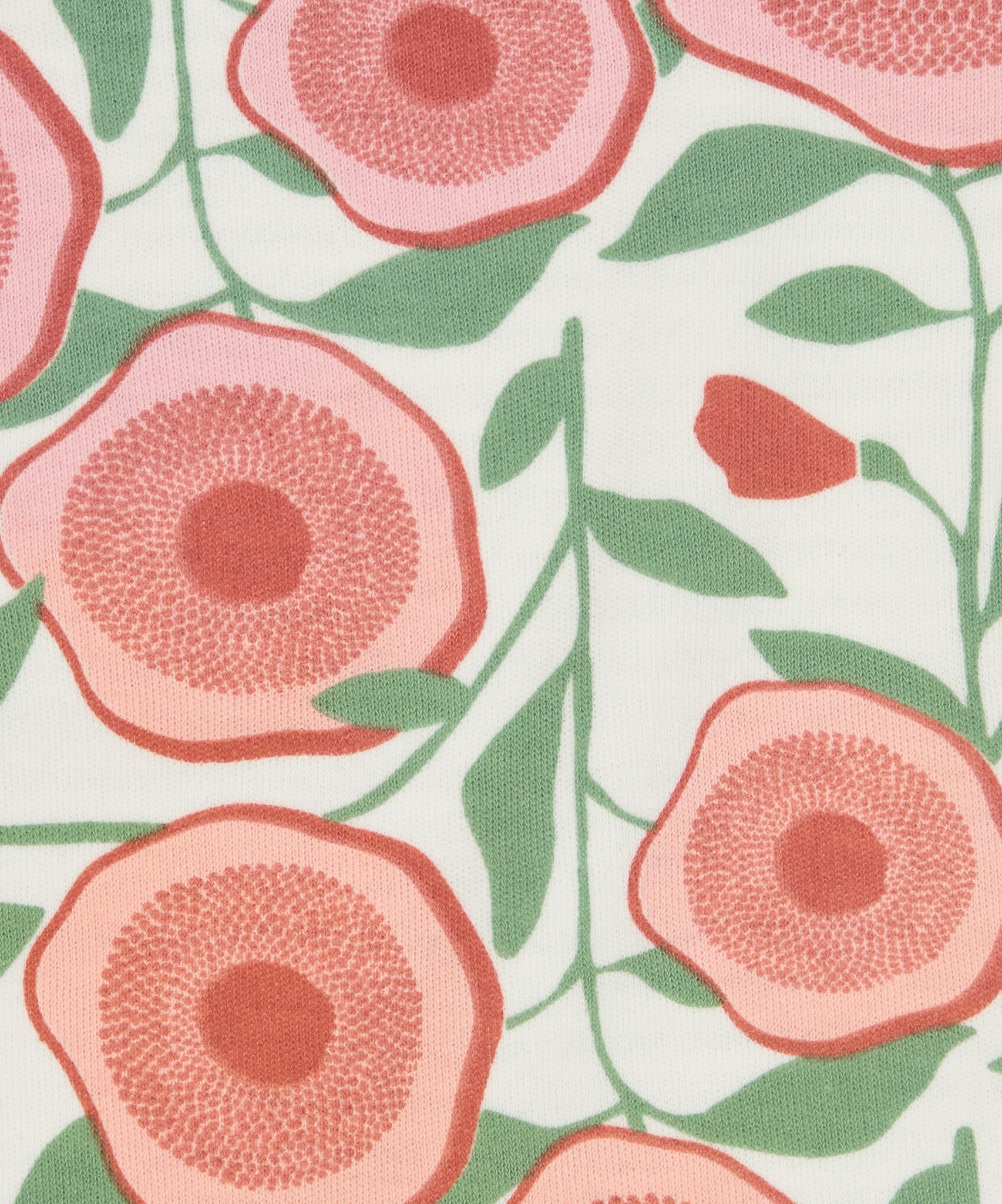 Close up of the Pigeon Organics large floral design printed on neutral coloured organic cotton fabric