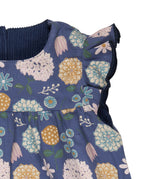A close up of the navy winter shift print detail on the Pigeon organics winter berry dress showing the frill detail available at Babipur